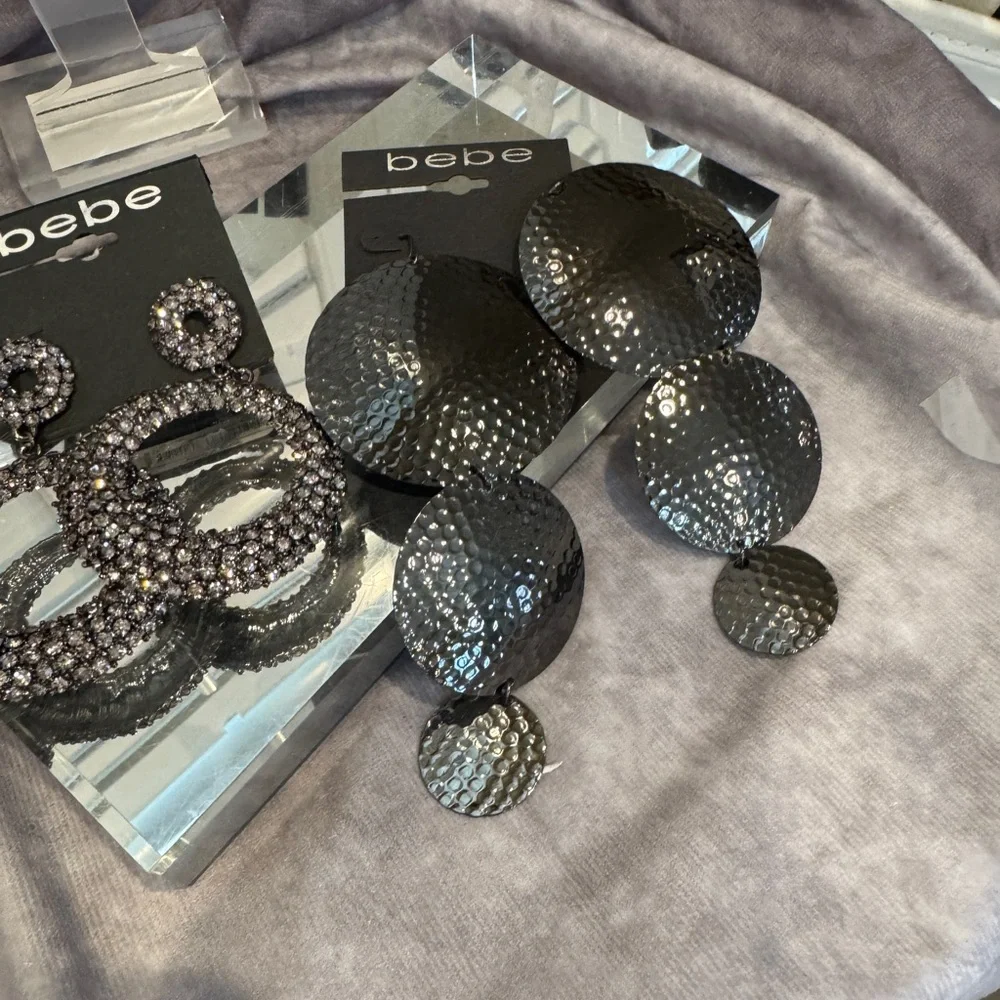 BEBE metallic gray, rhinestone earrings, worn once hammered chandelier $80 value